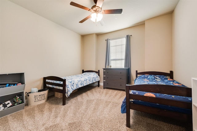 carpeted bedroom featuring a ceiling fan