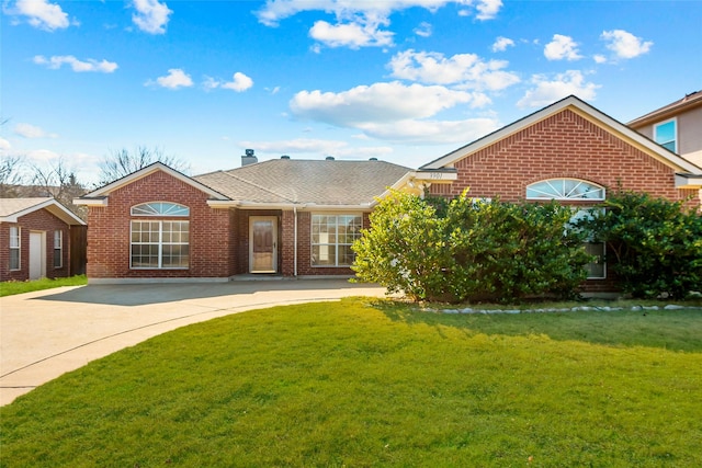 view of front of home with a front yard