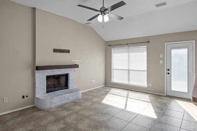 unfurnished living room featuring ceiling fan, tile patterned floors, a fireplace, and lofted ceiling