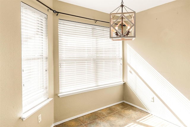 unfurnished dining area with tile patterned flooring