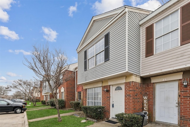 exterior space featuring a front lawn