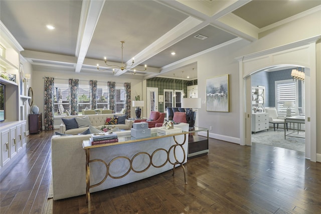 living room featuring dark hardwood / wood-style flooring, beamed ceiling, an inviting chandelier, ornamental molding, and coffered ceiling