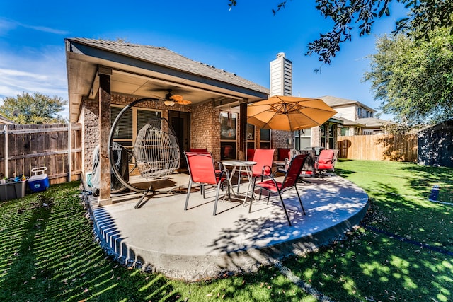 view of patio with ceiling fan