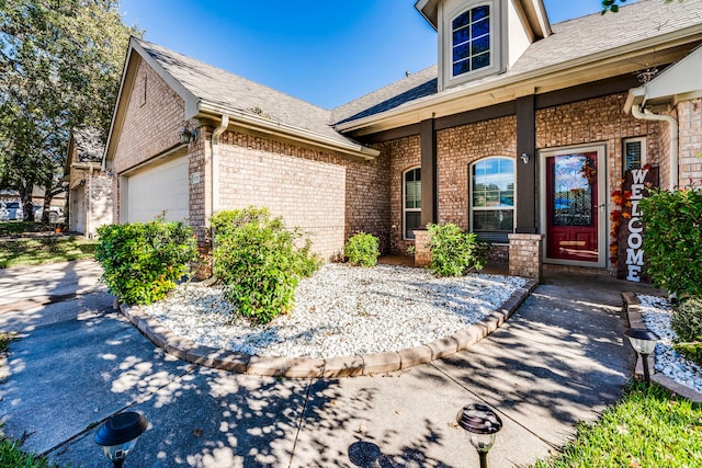 view of front of property featuring a garage