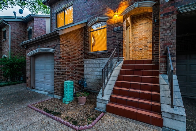 property entrance with a garage