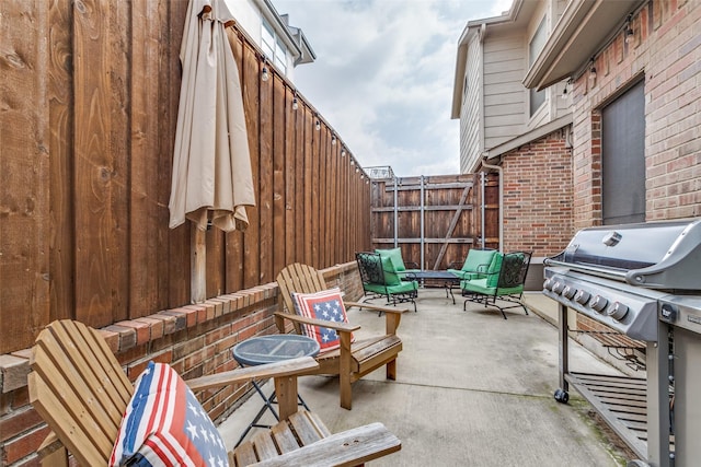 view of patio / terrace with grilling area and outdoor lounge area