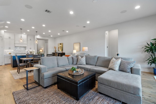 living room featuring light wood-type flooring