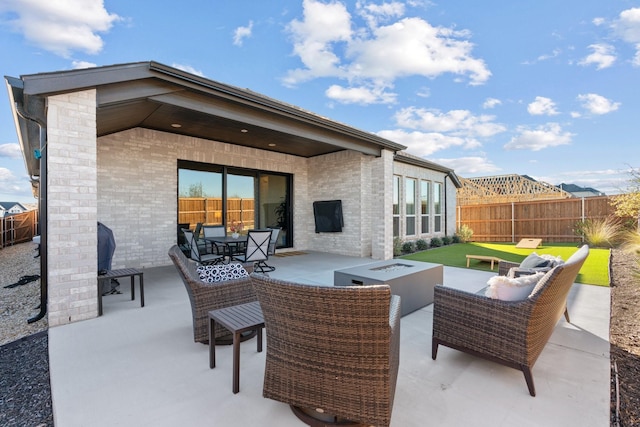 view of patio with fence and an outdoor living space