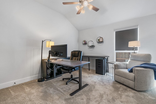 carpeted office space with ceiling fan and lofted ceiling