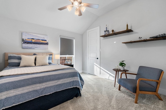 bedroom with carpet floors, vaulted ceiling, baseboards, and ceiling fan