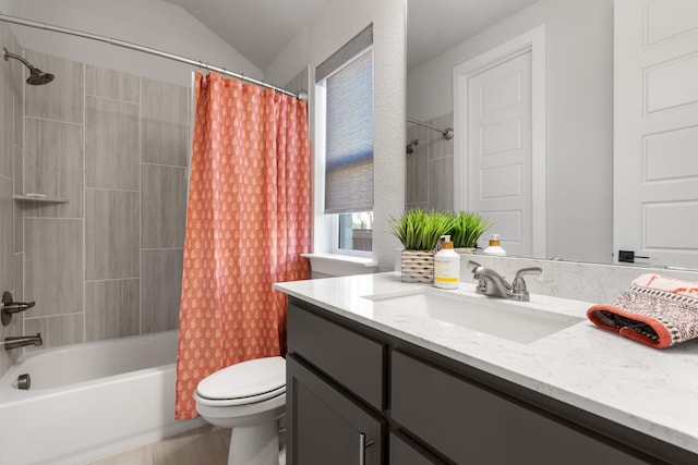 bathroom featuring lofted ceiling, shower / bathtub combination with curtain, vanity, and toilet