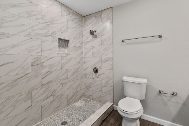 1206 W Hanna St, Denison, TX 75020 - full bathroom featuring tiled shower and wood finished floors