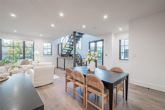 dining space featuring light wood-type flooring