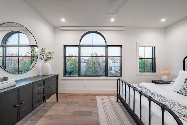 bedroom featuring light wood-type flooring