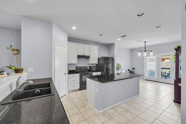 kitchen featuring light tile patterned flooring, sink, white cabinets, pendant lighting, and black appliances