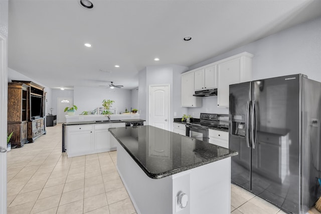 kitchen with white cabinetry, black appliances, kitchen peninsula, and a kitchen island