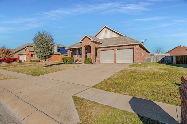 view of front of home with a garage and a front yard