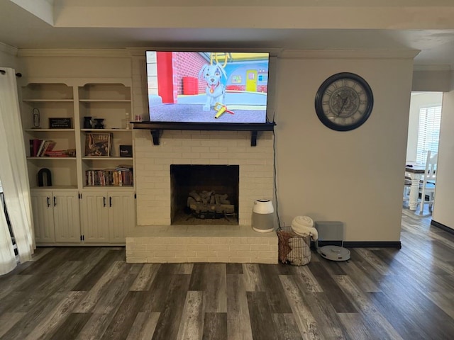 living room featuring a fireplace, dark hardwood / wood-style floors, and crown molding