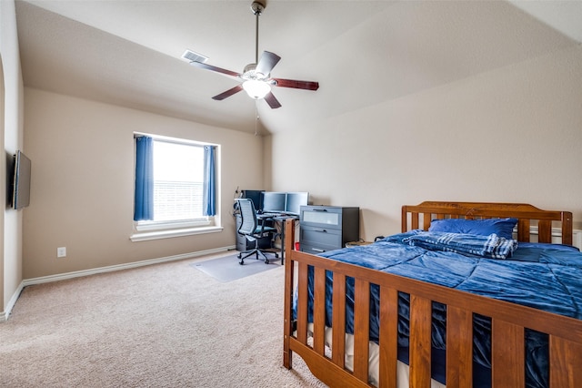 carpeted bedroom featuring lofted ceiling and ceiling fan