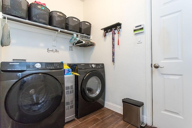 washroom with separate washer and dryer