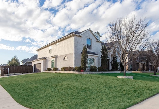 view of front facade with a front lawn