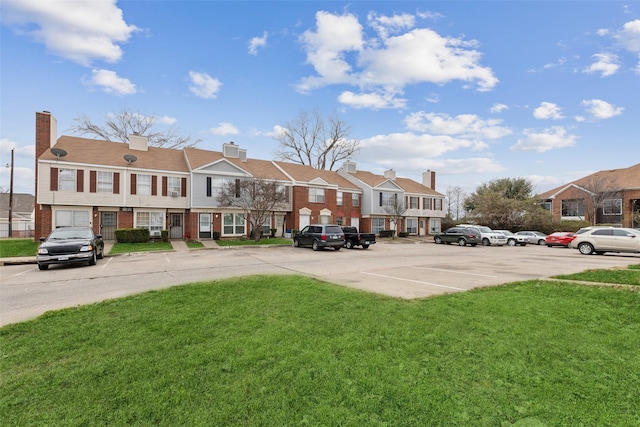 exterior space with a lawn