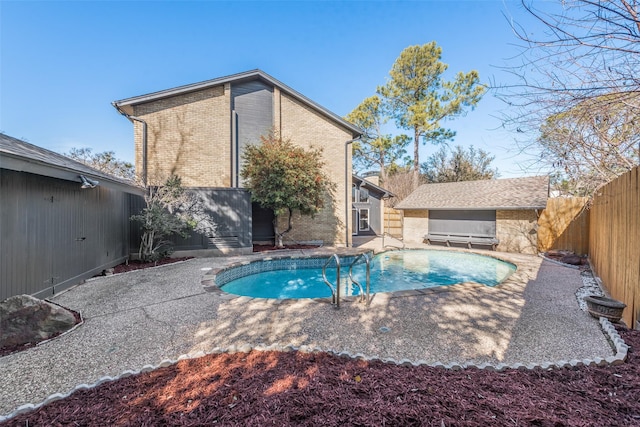 view of pool featuring a patio area