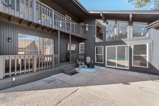 rear view of house featuring a patio