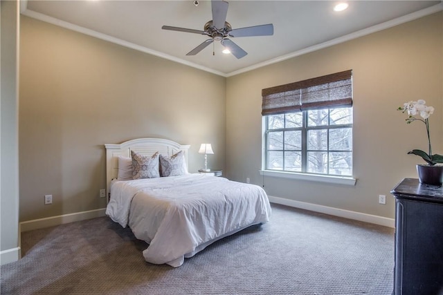 carpeted bedroom with ceiling fan and crown molding