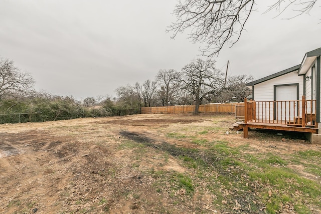 view of yard with a deck