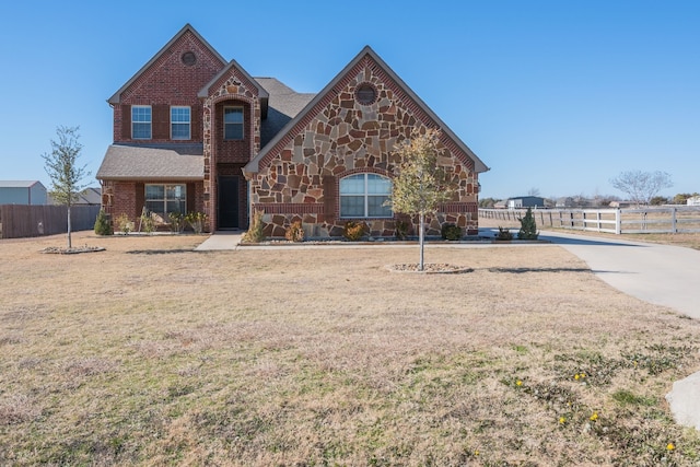 view of front of property with a front lawn