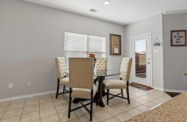 view of tiled dining space