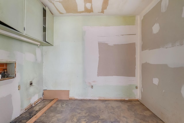 interior space featuring concrete flooring