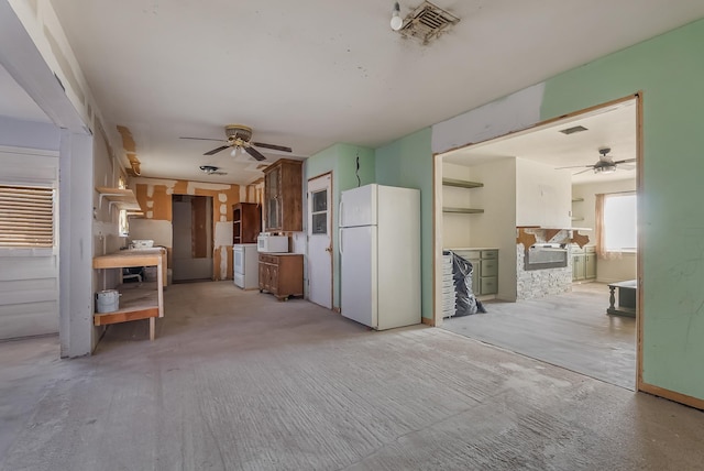 kitchen with white appliances and ceiling fan