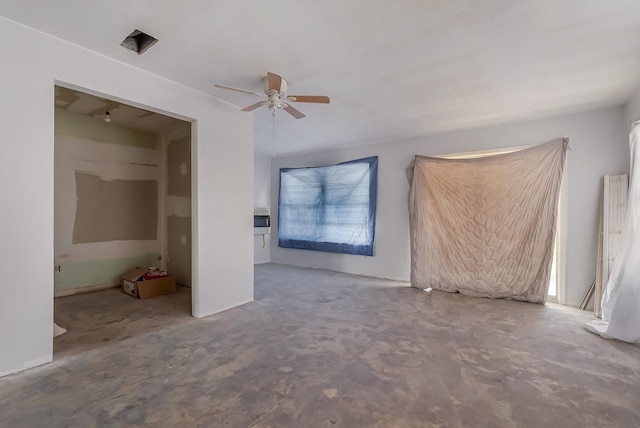 interior space featuring ceiling fan