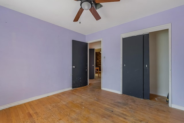 unfurnished bedroom with a closet, ceiling fan, and light hardwood / wood-style floors