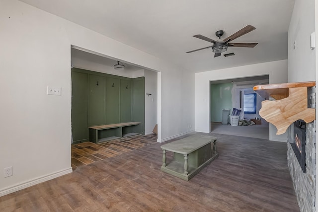 mudroom featuring ceiling fan and dark wood-type flooring