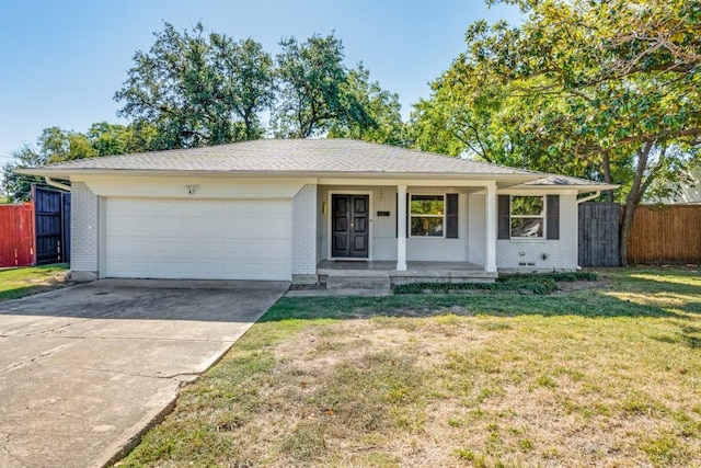 ranch-style home with a garage, a front lawn, and a porch