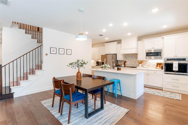 dining room featuring dark wood-type flooring