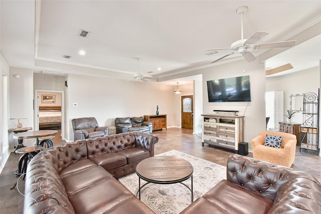 living room with crown molding and ceiling fan