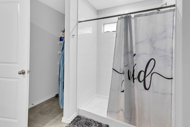 bathroom with a shower with curtain