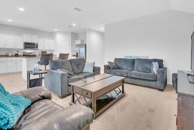 living room with lofted ceiling