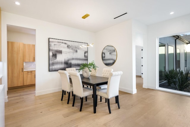 dining area featuring light hardwood / wood-style flooring