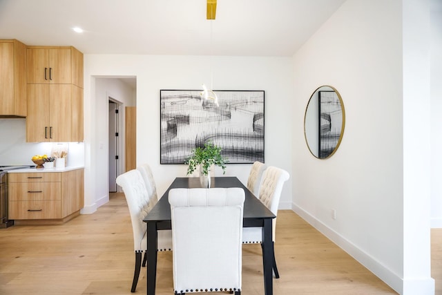 dining area featuring light hardwood / wood-style flooring