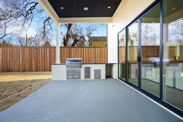 view of patio featuring area for grilling and grilling area