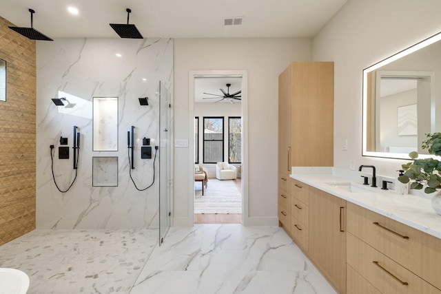 bathroom featuring vanity and walk in shower