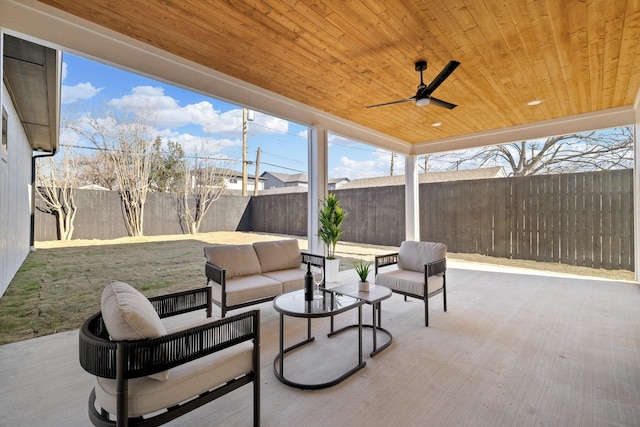 view of patio / terrace with ceiling fan and outdoor lounge area