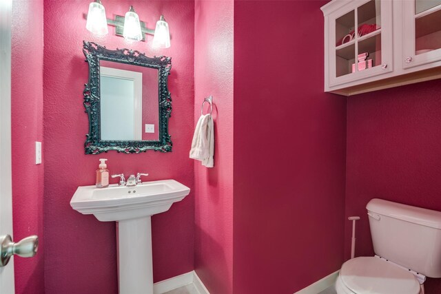 bathroom featuring tile patterned flooring and vanity