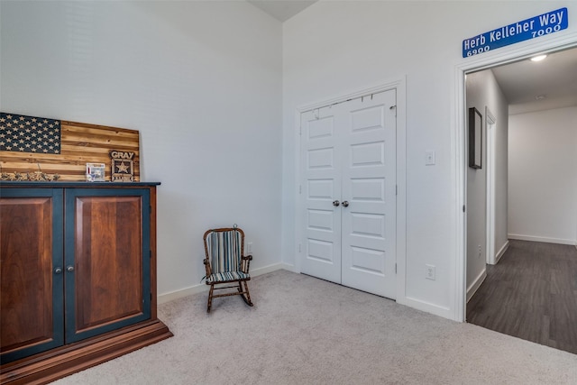 living area with carpet floors