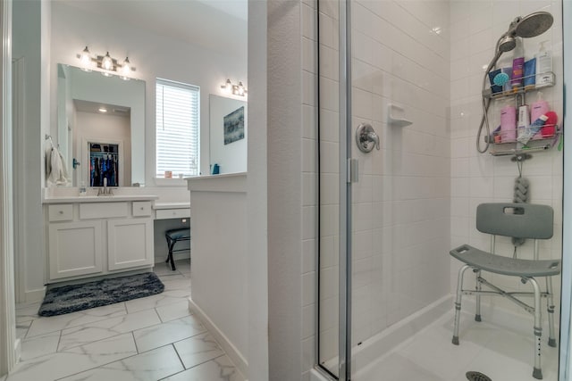 bathroom with vanity and an enclosed shower